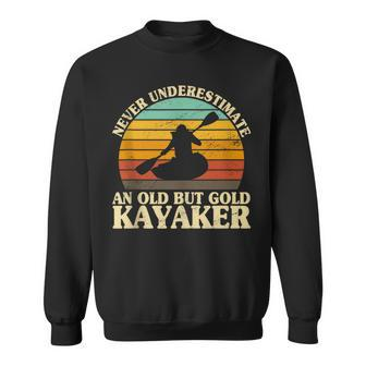 Never Underestimate An Old Kayaker Kayak Canoeing Sweatshirt - Monsterry