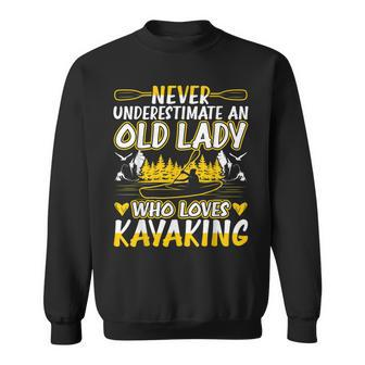 Never Underestimate An Old Kayaking Lady Sweatshirt - Monsterry