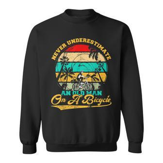 Never Underestimate An Old Man On A Bicycle Cycling Lover Sweatshirt | Mazezy