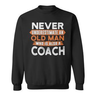 Never Underestimate An Old Man Who Is Also A Coach Sweatshirt - Seseable
