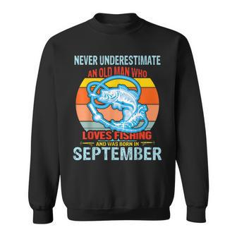 Never Underestimate An Old Man Who Loves Fishing Born In Sep Sweatshirt | Mazezy