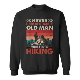 Never Underestimate Old Man Who Loves Hiking Vintage Sweatshirt - Thegiftio UK