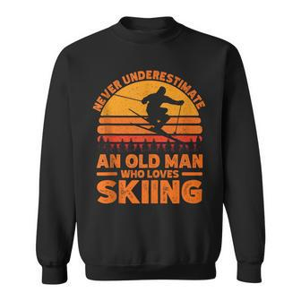 Never Underestimate An Old Man Who Loves Skiing Skiing Sweatshirt - Thegiftio UK