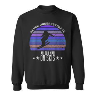 Never Underestimate An Old Man On Skis Skier Sweatshirt - Seseable