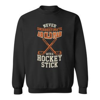 Never Underestimate An Old Man With A Stick Old Man Hockey Sweatshirt - Seseable
