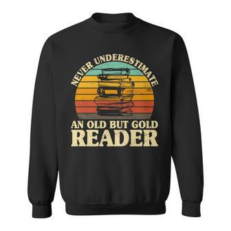 Never Underestimate An Old Reader Bookworm Library Librarian Sweatshirt - Monsterry