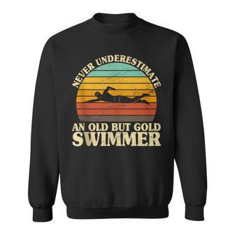 Never Underestimate An Old Swimmer Lifeguard Swimming Swim Sweatshirt - Monsterry DE