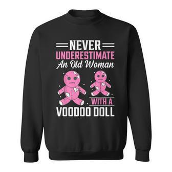 Never Underestimate An Old Woman With A Voodoo Doll Old Woman Sweatshirt | Mazezy