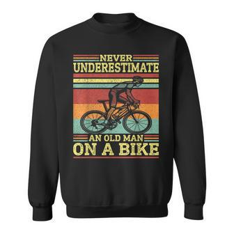 Vintage Cycling Never Underestimate An Old Man On A Bike Sweatshirt - Seseable