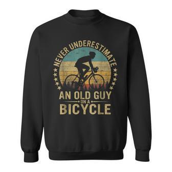 Vintage Never Underestimate An Old Guys On A Bicycle Cycling Cycling Funny Gifts Sweatshirt | Mazezy