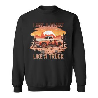 Western Sunset Cowgirl Funny I Got A Heart Like A Truck Sweatshirt | Mazezy DE