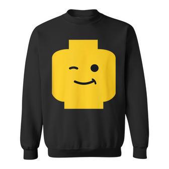 Winking Winky Face Minifig Brick Toy Sweatshirt | Mazezy