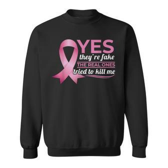 Yes They're Fake My Real Ones Tried To Kill Me Breast Cancer Sweatshirt | Mazezy