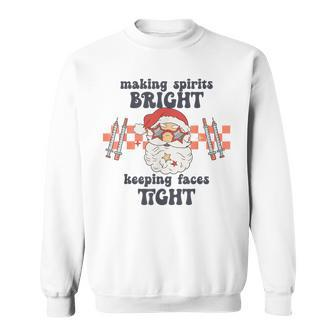 Making Spirits Bright Keeping Faces Tight Santa Christmas Sweatshirt | Mazezy