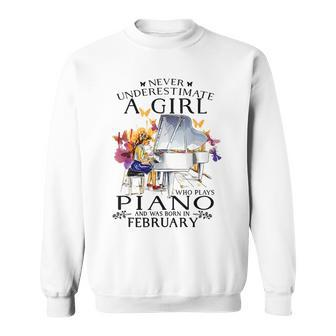Never Underestimate A Girl Who Plays Piano Born In February Sweatshirt - Seseable