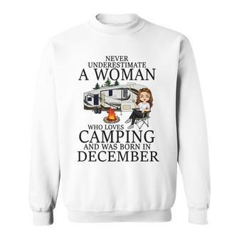 Never Underestimate A Woman Who Loves Camping Born December Sweatshirt - Seseable