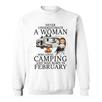 Never Underestimate A Woman Who Loves Camping Born February Sweatshirt - Seseable