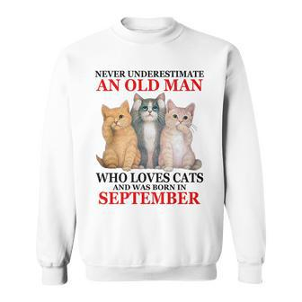Never Underestimate An Old Man Who Loves Cat September Sweatshirt - Seseable