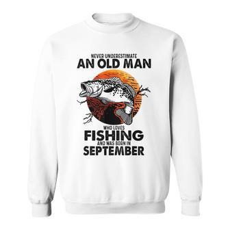 Never Underestimate An Old Man Who Loves Fishing September Sweatshirt - Seseable