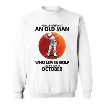 Never Underestimate An Old October Man Who Loves Golf Sweatshirt - Seseable