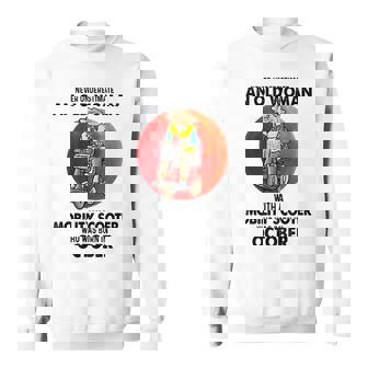 Never Underestimate An Old Woman Mobility Scooter October Old Woman Funny Gifts Sweatshirt | Mazezy