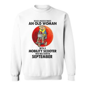 Never Underestimate An Old Woman Mobility Scooter September Old Woman Funny Gifts Sweatshirt | Mazezy DE
