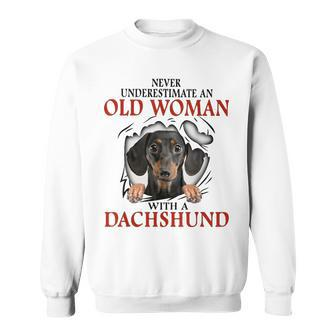 Never Underestimate An Old Woman With A Dachshund Sweatshirt - Seseable