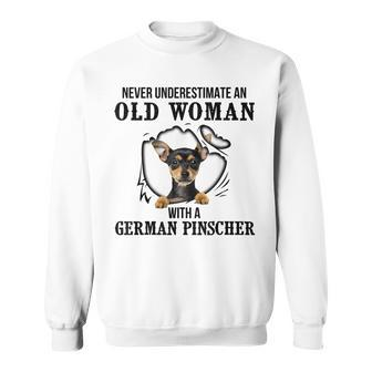 Never Underestimate An Old Woman With A German Pinscher Old Woman Funny Gifts Sweatshirt | Mazezy
