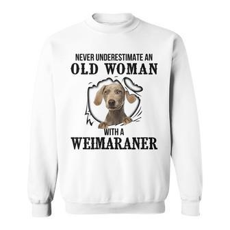 Never Underestimate An Old Woman With A Weimaraner Old Woman Funny Gifts Sweatshirt | Mazezy