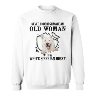Never Underestimate An Old Woman With A White Siberian Husky Old Woman Funny Gifts Sweatshirt | Mazezy