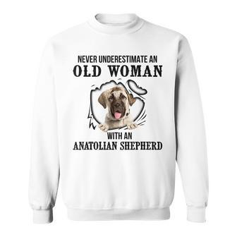 Never Underestimate An Old Woman With An Anatolian Shepherd Old Woman Funny Gifts Sweatshirt | Mazezy