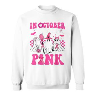 In October We Wear Pink Breast Cancer Ghosts Halloween Sweatshirt | Mazezy