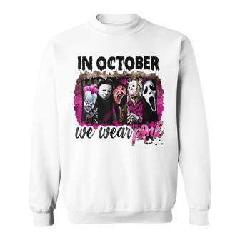 In October We Wear Pink Horror Movie Halloween Breast Cancer Sweatshirt | Mazezy
