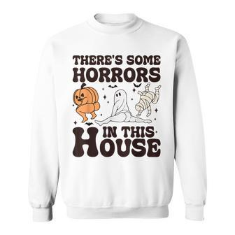 There's Some Horrors In This House Halloween Pumpkin Ghost Sweatshirt | Mazezy