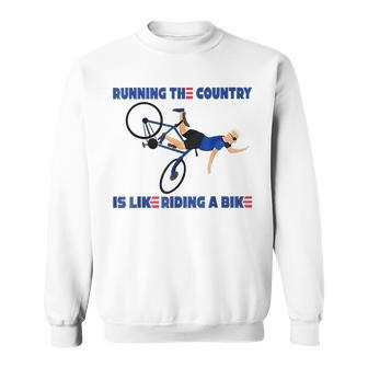 Running The Country Is Like Riding A Bike Funny Biden Running Funny Gifts Sweatshirt | Mazezy