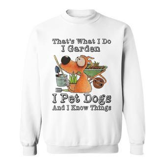 That's What I Do I Garden I Pet Dogs And I Know Things Sweatshirt - Seseable