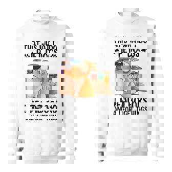 Thats What I Do I Pet Dogs I Read Books And I Forget Things Sweatshirt | Mazezy