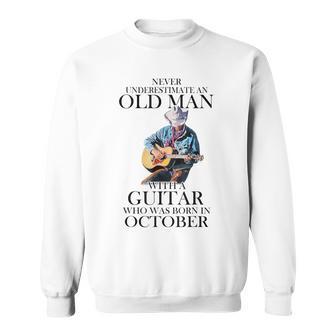 Never Underestimate A October Man With A Guitar Sweatshirt | Mazezy