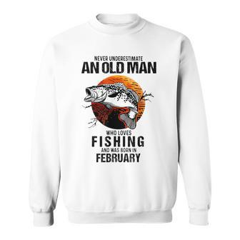 Never Underestimate An Old February Man Who Loves Fishing Sweatshirt | Mazezy