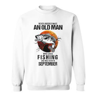 Never Underestimate An Old September Man Who Loves Fishing Sweatshirt | Mazezy