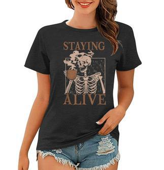 Staying Alive Skeleton Drink Coffee Funny Skull Halloween Women T-shirt | Mazezy