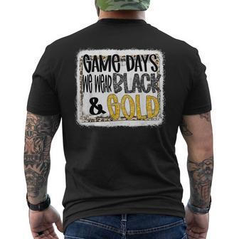 On Gameday Football We Wear Black And Gold School Spirit Men's T-shirt Back Print - Seseable