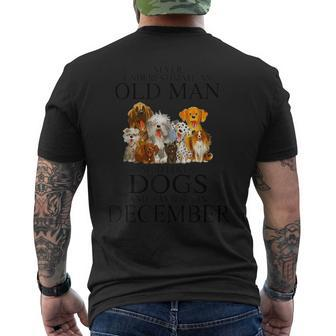 Never Underestimate An Old Man Who Loves Dogs In December Men's T-shirt Back Print - Seseable