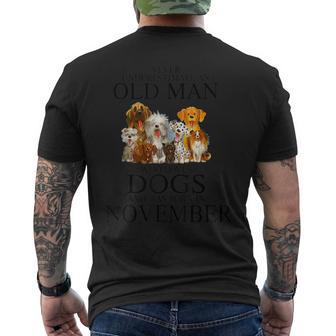 Never Underestimate An Old Man Who Loves Dogs In November Men's T-shirt Back Print - Seseable