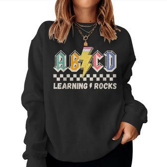 Abcd Learning Rocks Pencil Lightning Teachers Rock Boy Women Sweatshirt | Mazezy