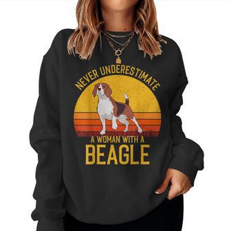 Beagle Never Underestimate A Woman With A Beagle Women Sweatshirt - Monsterry
