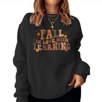 Fall In Love With Learning Fall Teacher Thanksgiving Retro Women Sweatshirt - Thegiftio UK