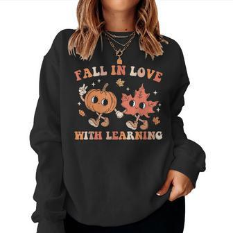 Fall In Love With Learning Fall Teacher Thanksgiving Retro Women Sweatshirt - Monsterry DE