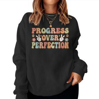 Back To School Progress Over Perfection Teacher Groovy Women Sweatshirt | Mazezy DE