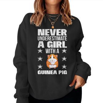 Girls Never Underestimate A Girl With A Guinea Pig Women Sweatshirt - Monsterry DE